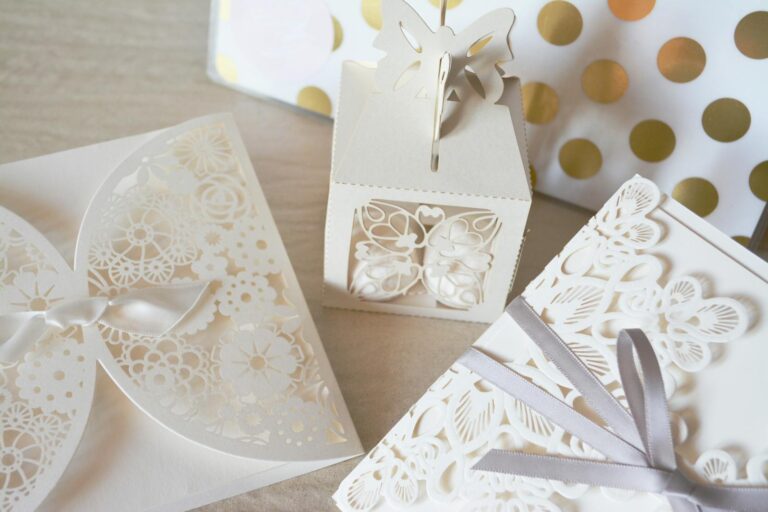 Elegant wedding invitation suite with calligraphy and laser-cut design, symbolizing modern digital invites