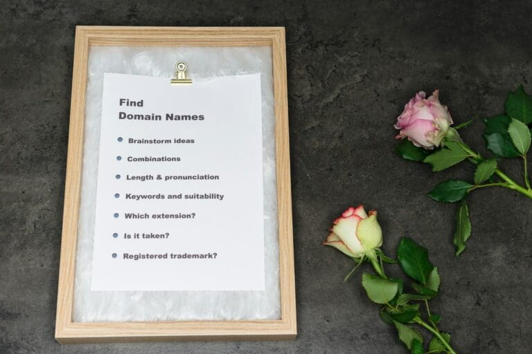 Wedding planning checklist on a clipboard with flowers