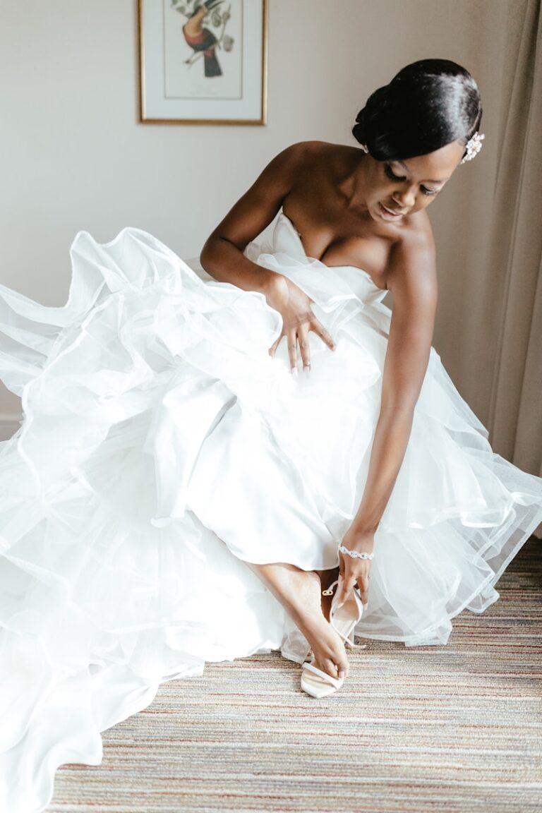 Bride wearing a flowing wedding dress, showcasing 2025 bridal trends